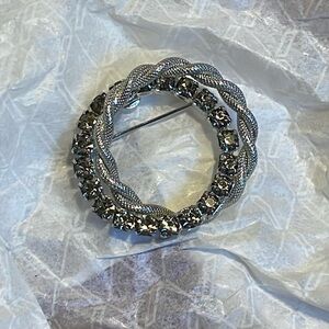 Sparkly 50s circle brooch with rhinestones
